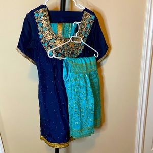 Womens small Punjabi-styled light and navy blue kameez and gharara outfit.